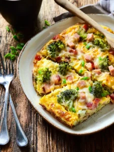 Slow Cooker Breakfast Recipe with Broccoli, Ham, and Swiss First Image